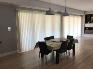 white Veri shades in a dining area