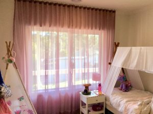 Rose coloured S fold sheer curtains 1