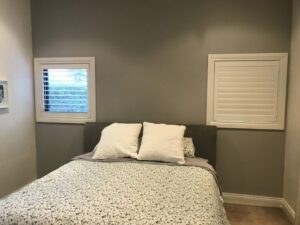 white plantation shutters in a Mitcham bedroom